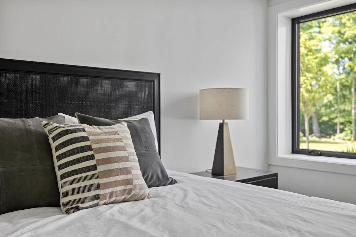 Snuggled up in my comfy bed with the soft glow of the lamp, feeling like a little sleepy bear.