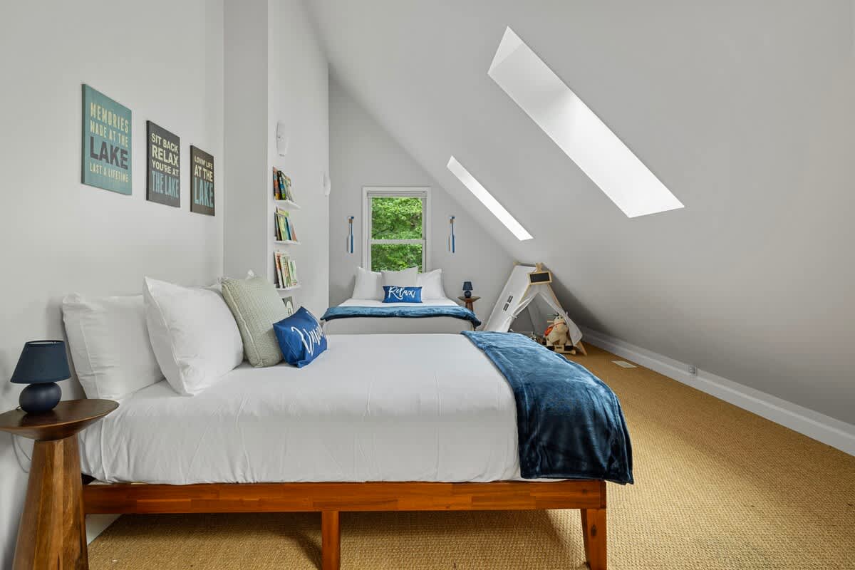 Bedroom 4 is on the upper level & has a 2 full-size beds.