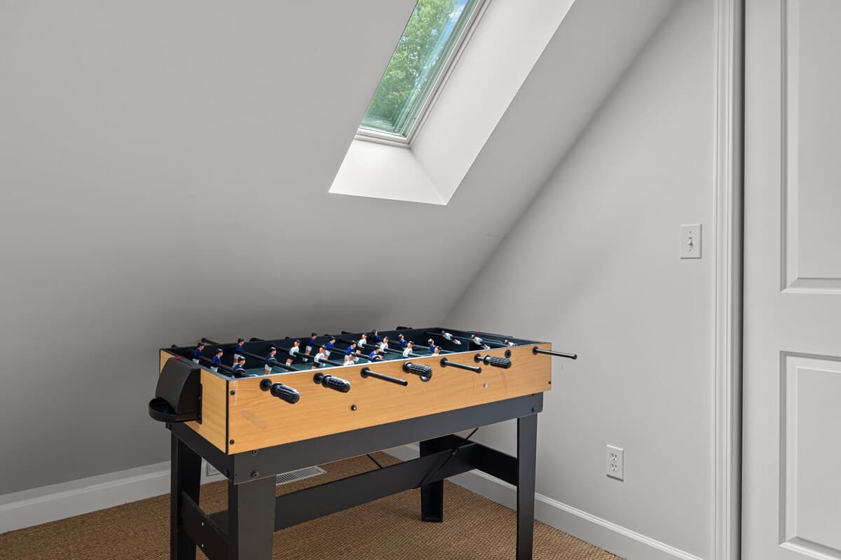 Game on! Foosball fun under the skylight!