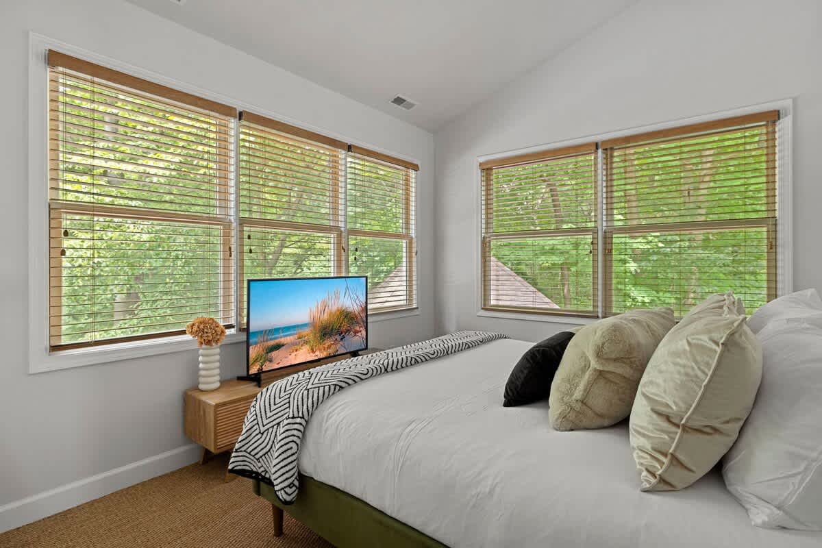 Bedroom 3 is on the upper level & has a king-size bed.
