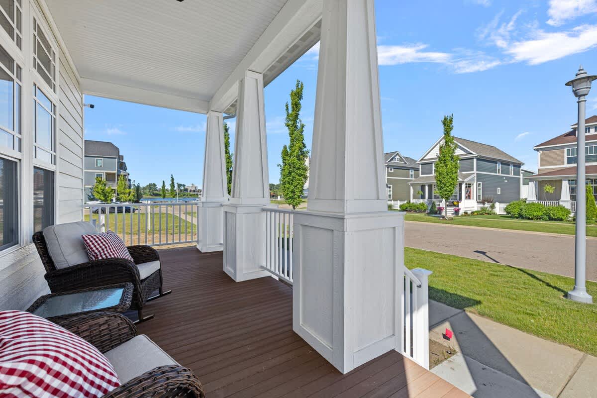 Comfy rattan rocking chairs on a covered porch? Two words - Relaxation Station.