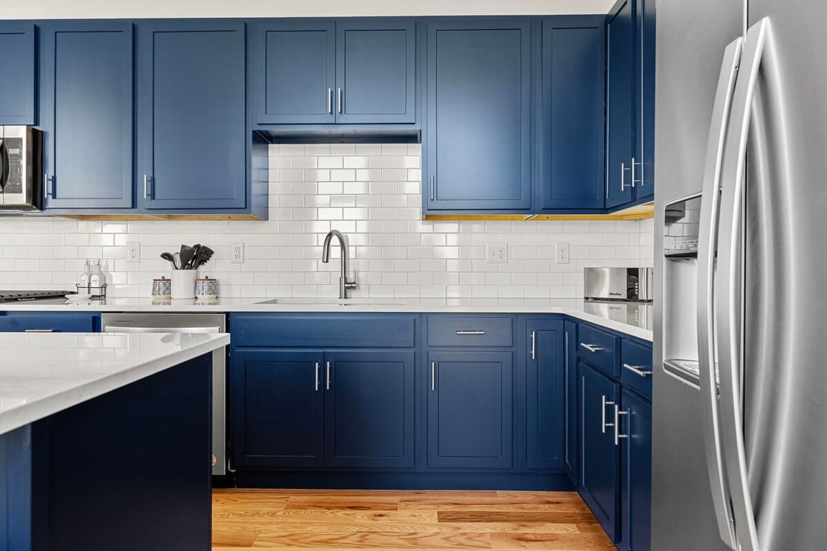 Custom cabinets + tile back splashes, stone counters, stainless appliances. Yep.