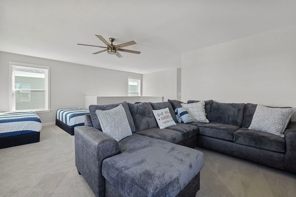We hear our guests love this plush and super-comfy wraparound couch upstairs.