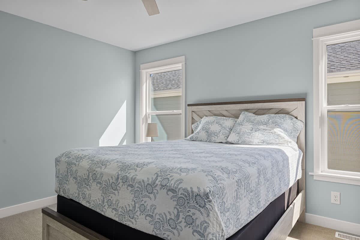 Bedroom 2 is on the upper level & has a queen-size bed.