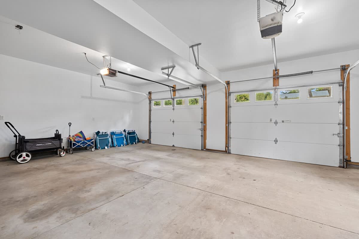 Room for cars, gear, and so much more—this garage is ready for action!