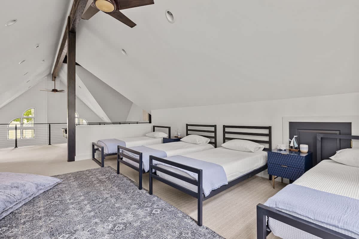 Additional sleeping on the loft with 4 twin-size beds.