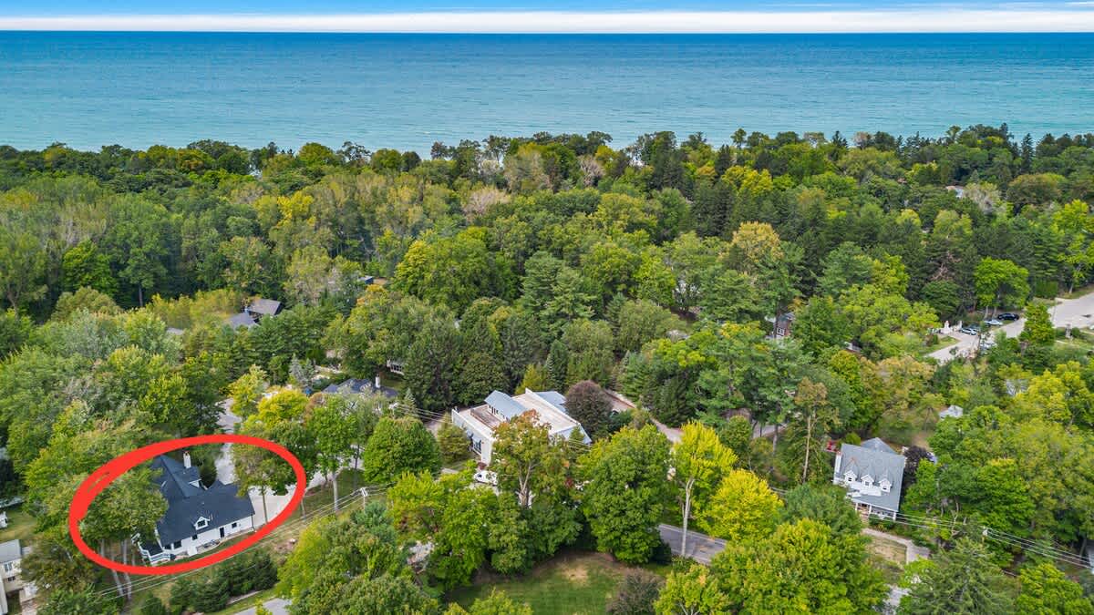 Surrounded by nature, with the calming sound of waves in the distance.