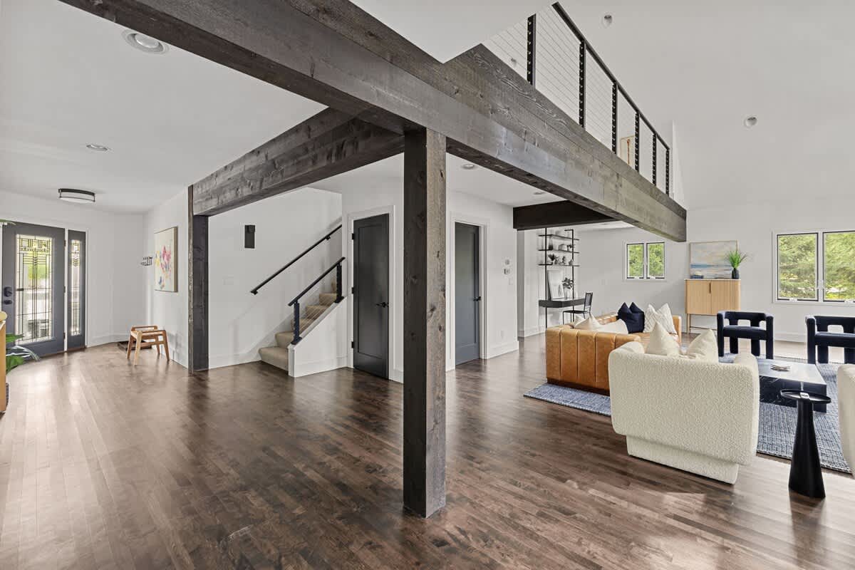 This living room has beams and dreams—make yourself at home!