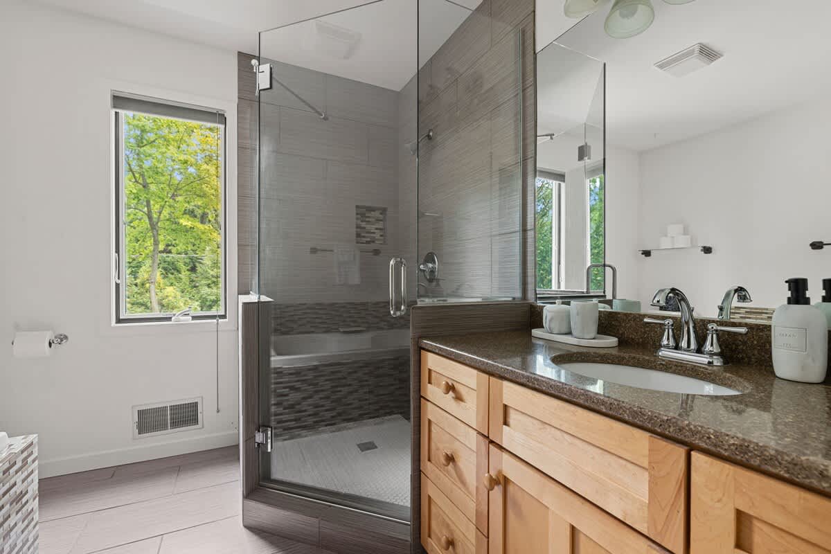 Refreshing inside and out—this bathroom brings nature to the daily routine.