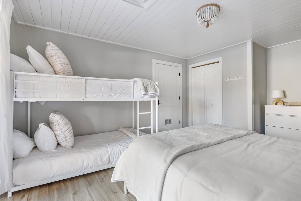 Bedroom 8 is on the lower level & has queen-size bed and twin-size bunkbeds.