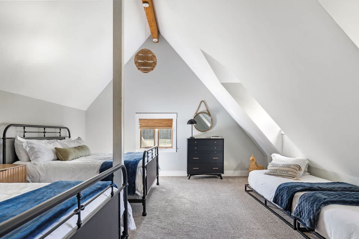 Bedroom 6 is on the upper level & has 2 king-size beds, 2 twin-size beds & a crib.