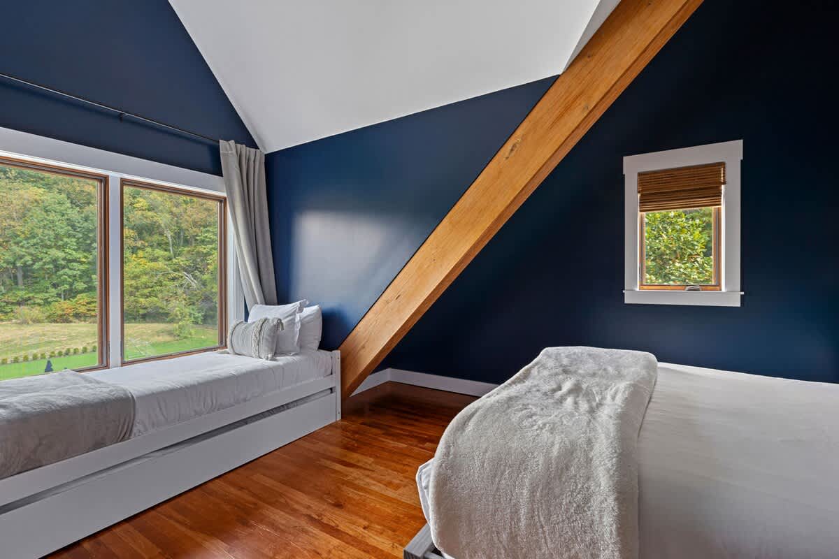 Bedroom 5 is on the upper level & has queen-size bed and 2 twin-size beds.