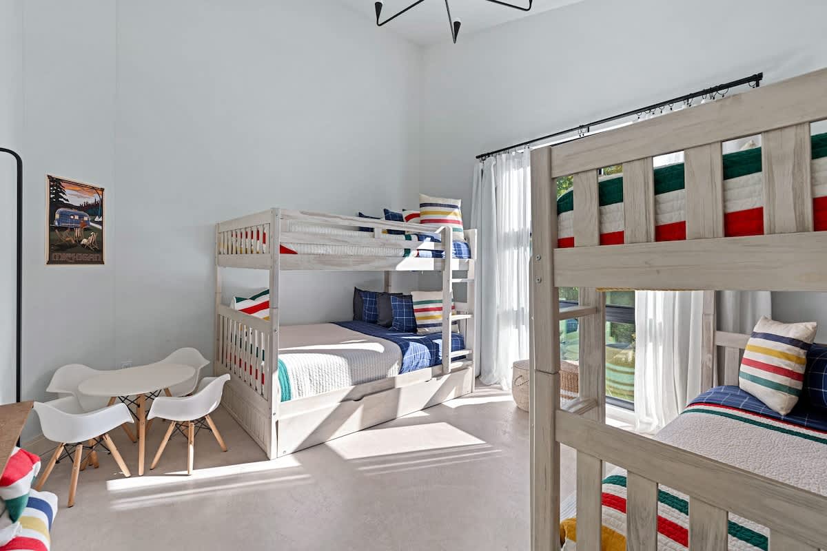 Bedroom 4 has 2 full-size bunkbeds and 2 trundle beds.