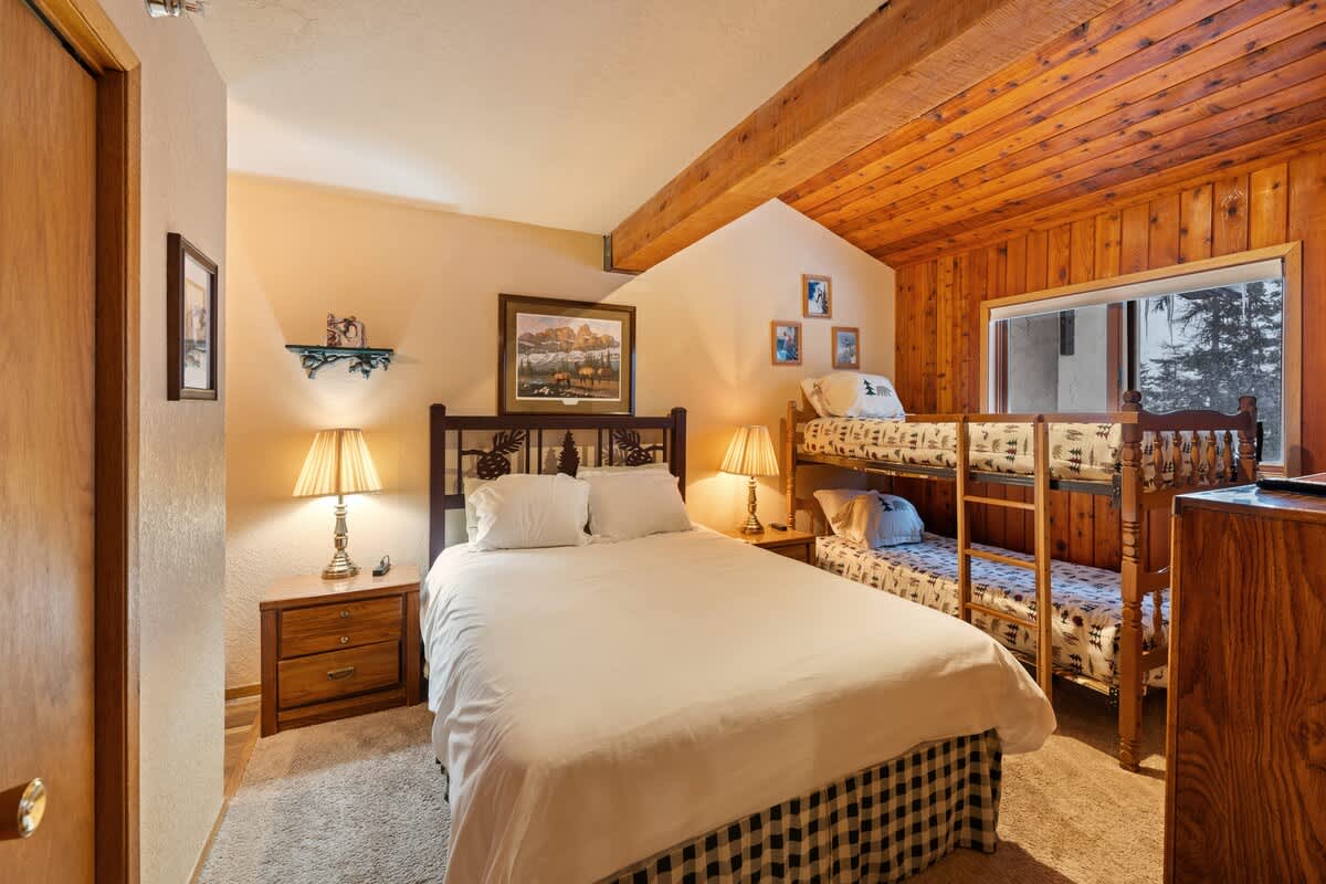 Bedroom 1 has queen & twin-size bunkbed.