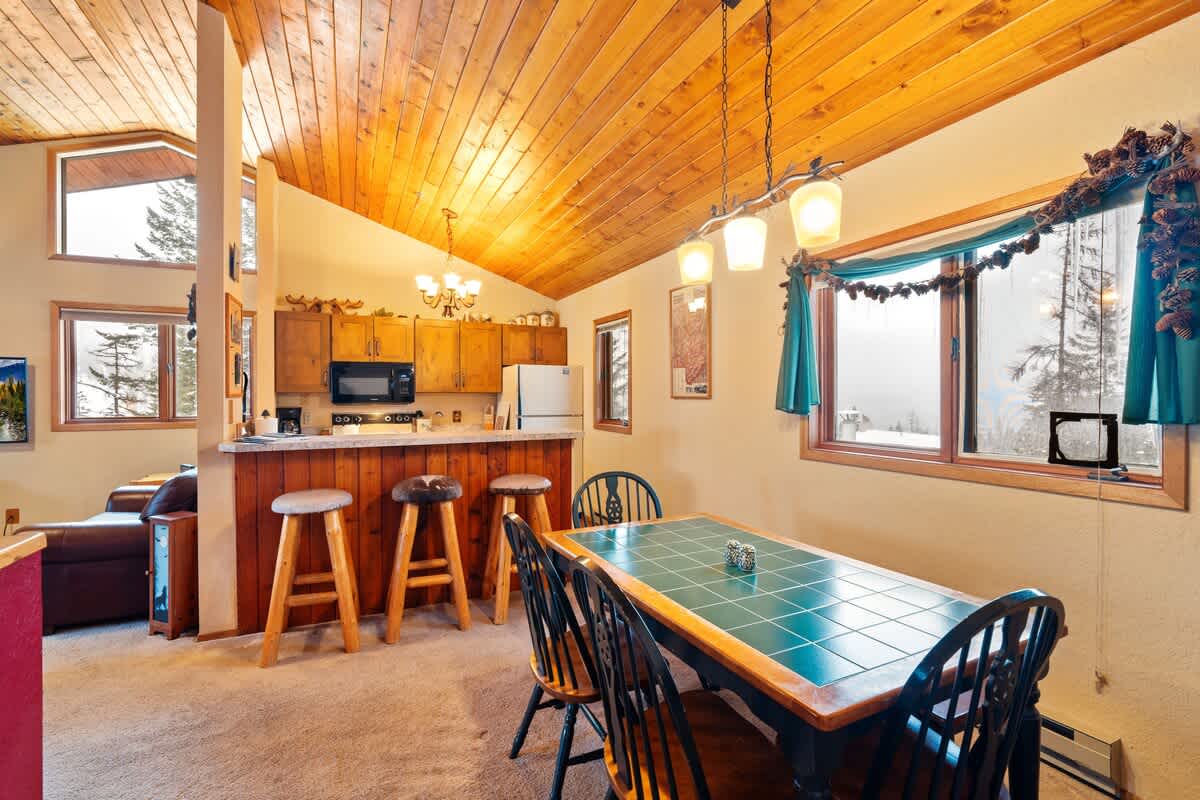 Gather around the table and let the good times roll in this inviting space.