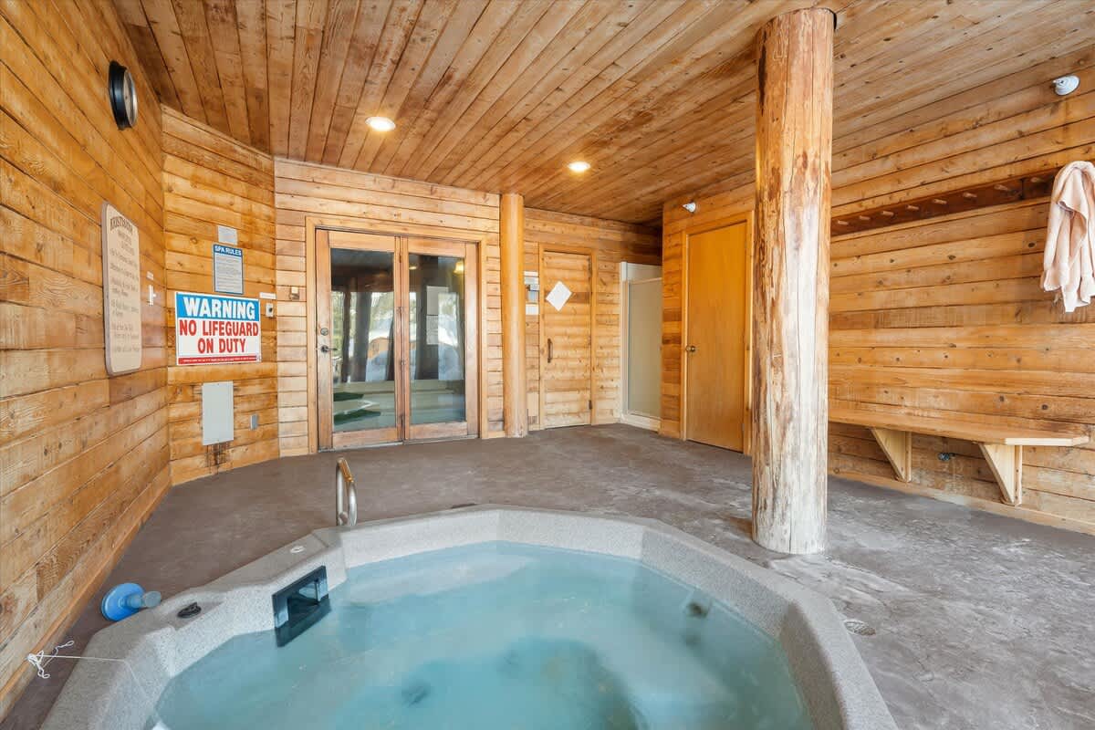 A warm and inviting hot tub, perfect for soaking up the mountain views.