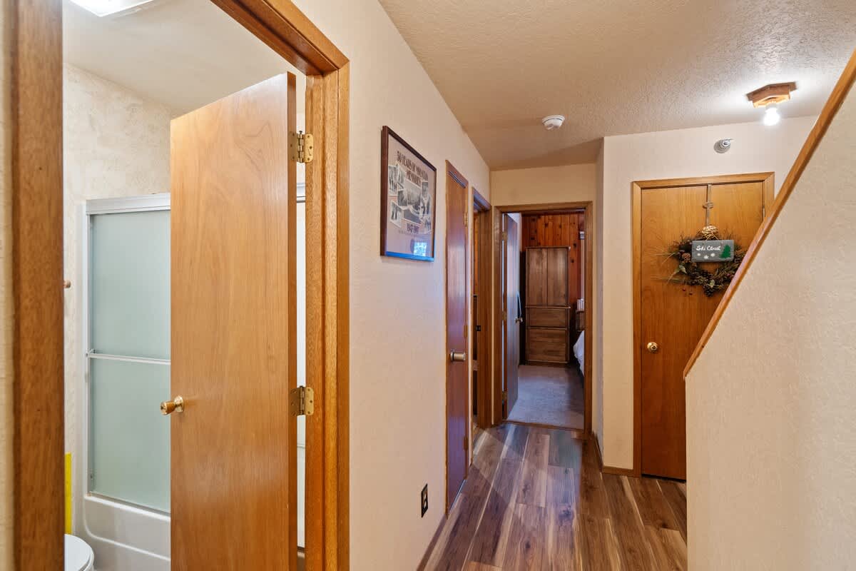 This hallway invites you to explore what lies beyond the door.