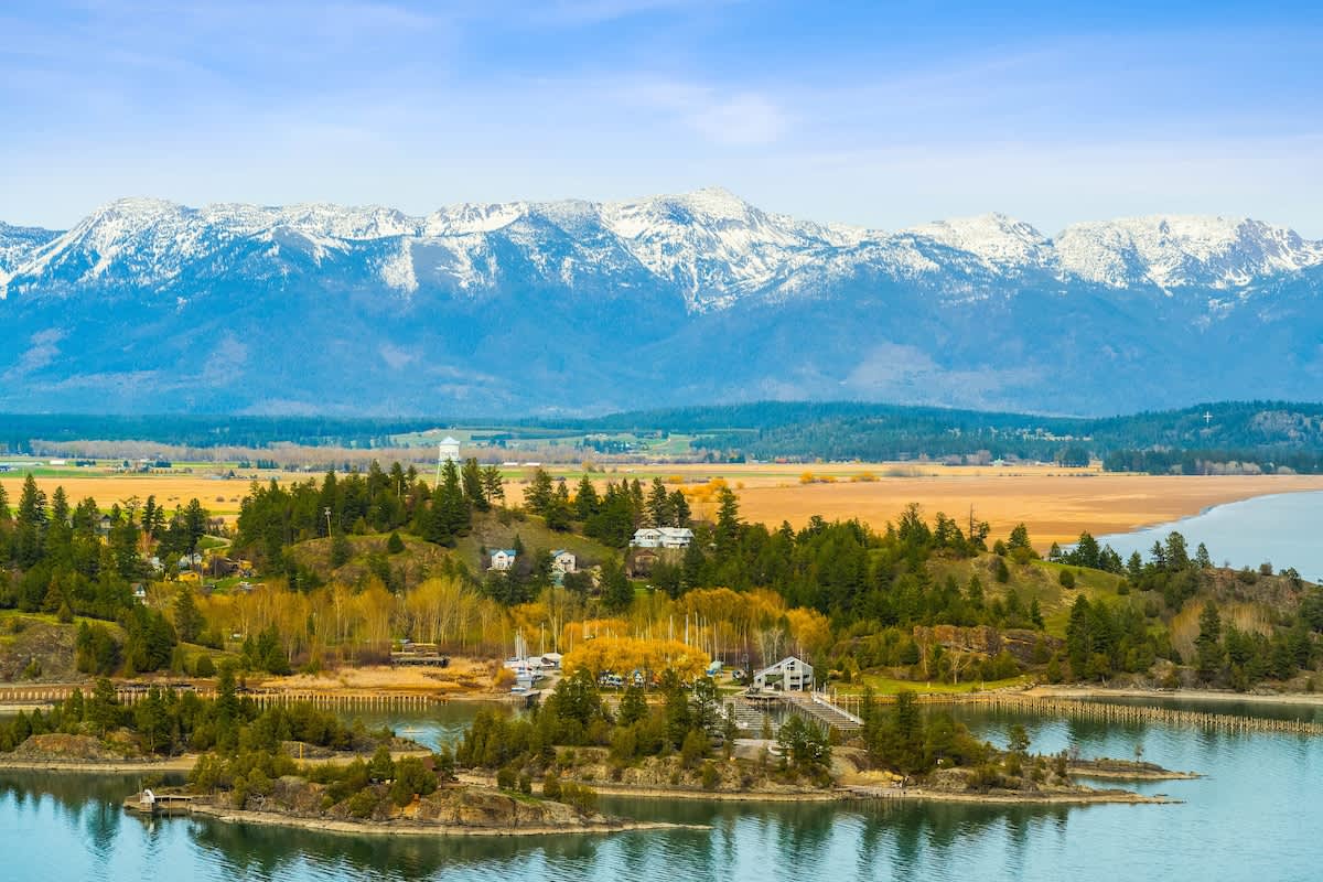 Where the mountains kiss the shoreline—pure tranquility.