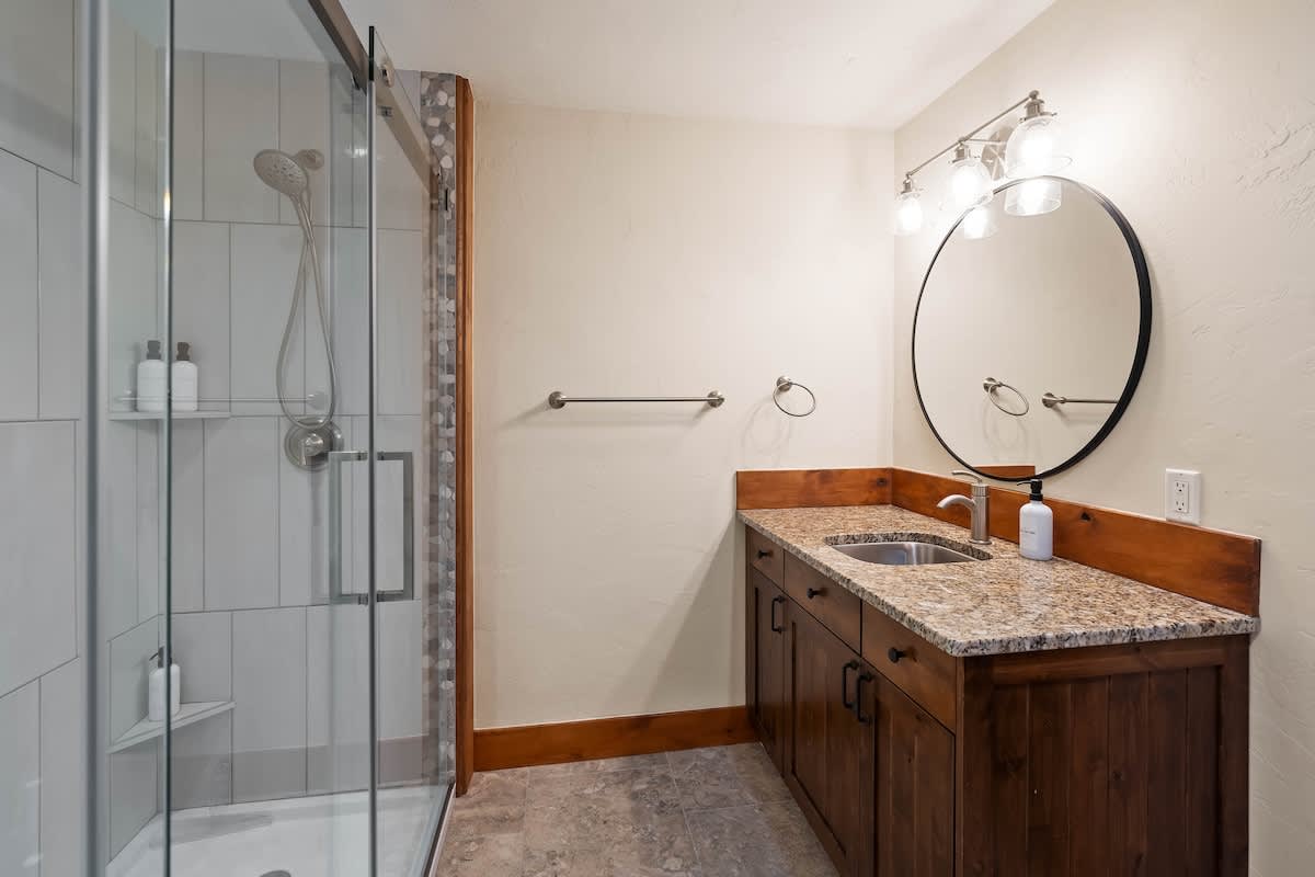 Rustic elegance meets modern refresh—bathroom goals achieved.