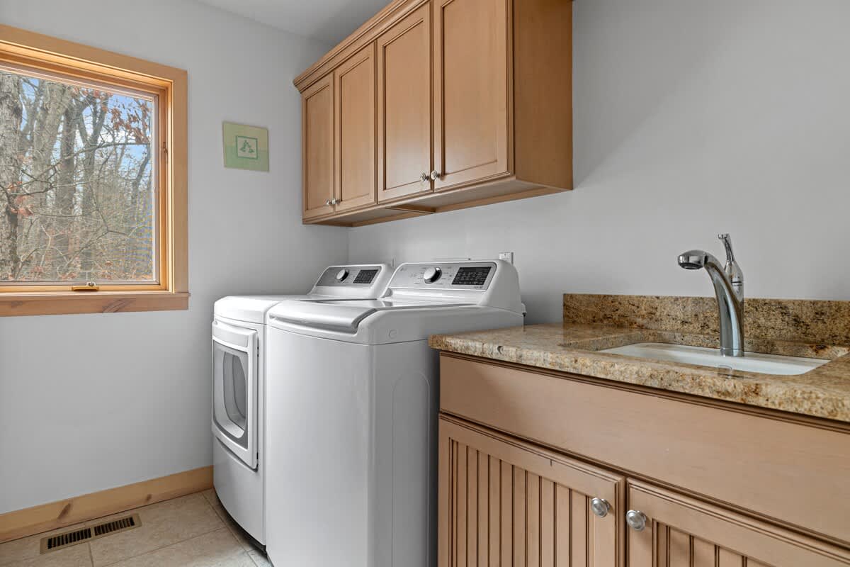 Clean clothes, forest views, and granite counters? Yes please.