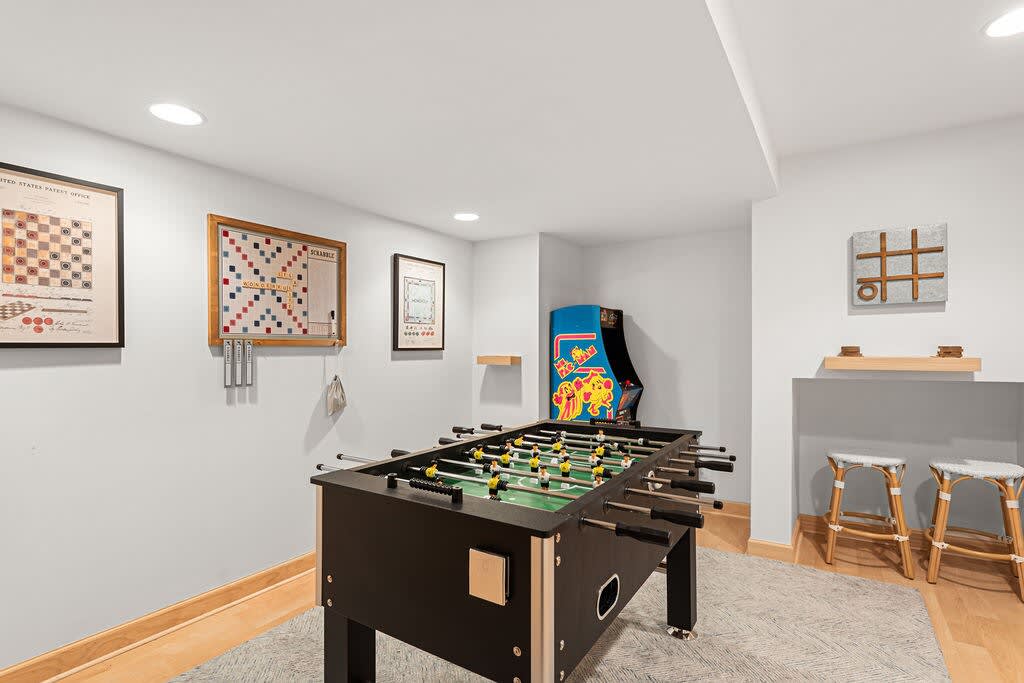 From foosball to throwback arcade games, this is where game night dreams come true.