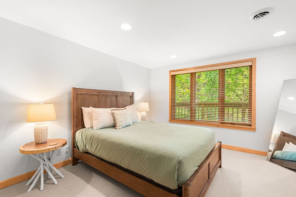 Bedroom 5 is on the lower level & has a queen-size bed.