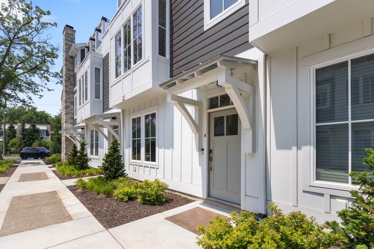 From the sidewalk to the doorstep, this house knows how to make an impression.