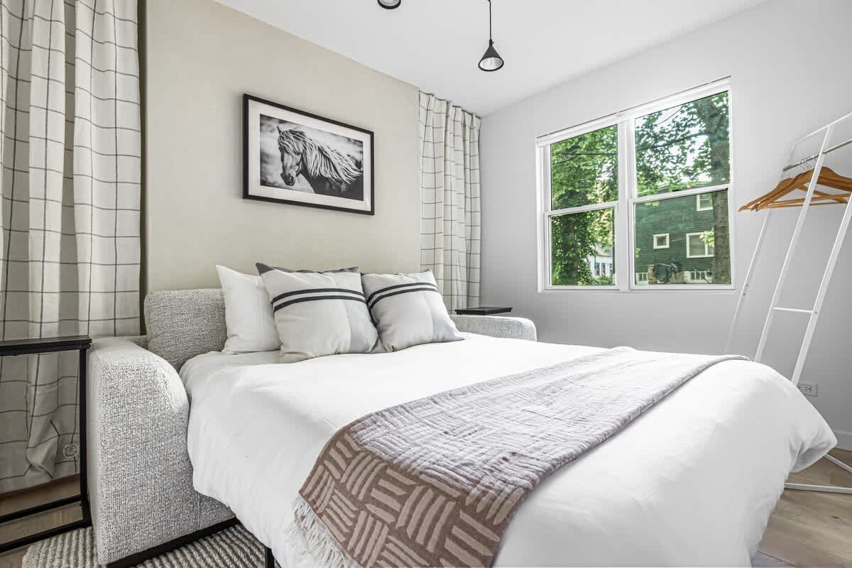 Bedroom 2 is on the main level & has a queen-size sofa bed.