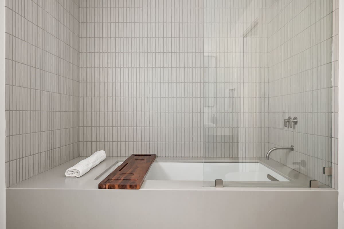 Tile perfection + bath tray essentials = your new happy place.