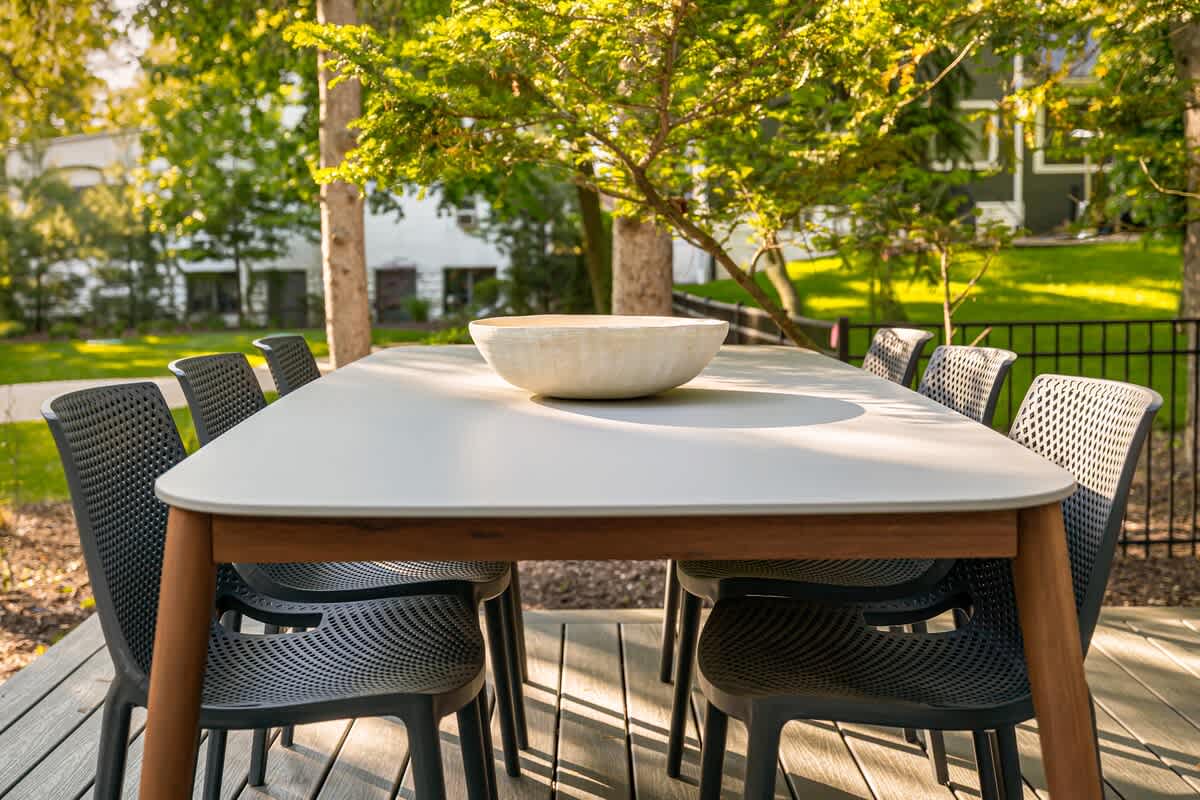 Deck dinners hit different in the dappled light.