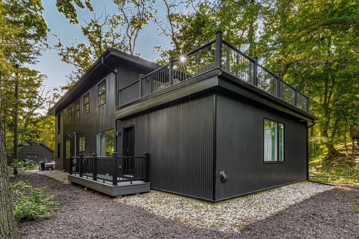 Bold. Modern. Tucked into the trees.