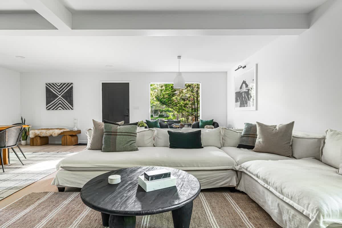 Sink into cloud-like comfort —this living room is calling for lazy afternoons and your favorite book.