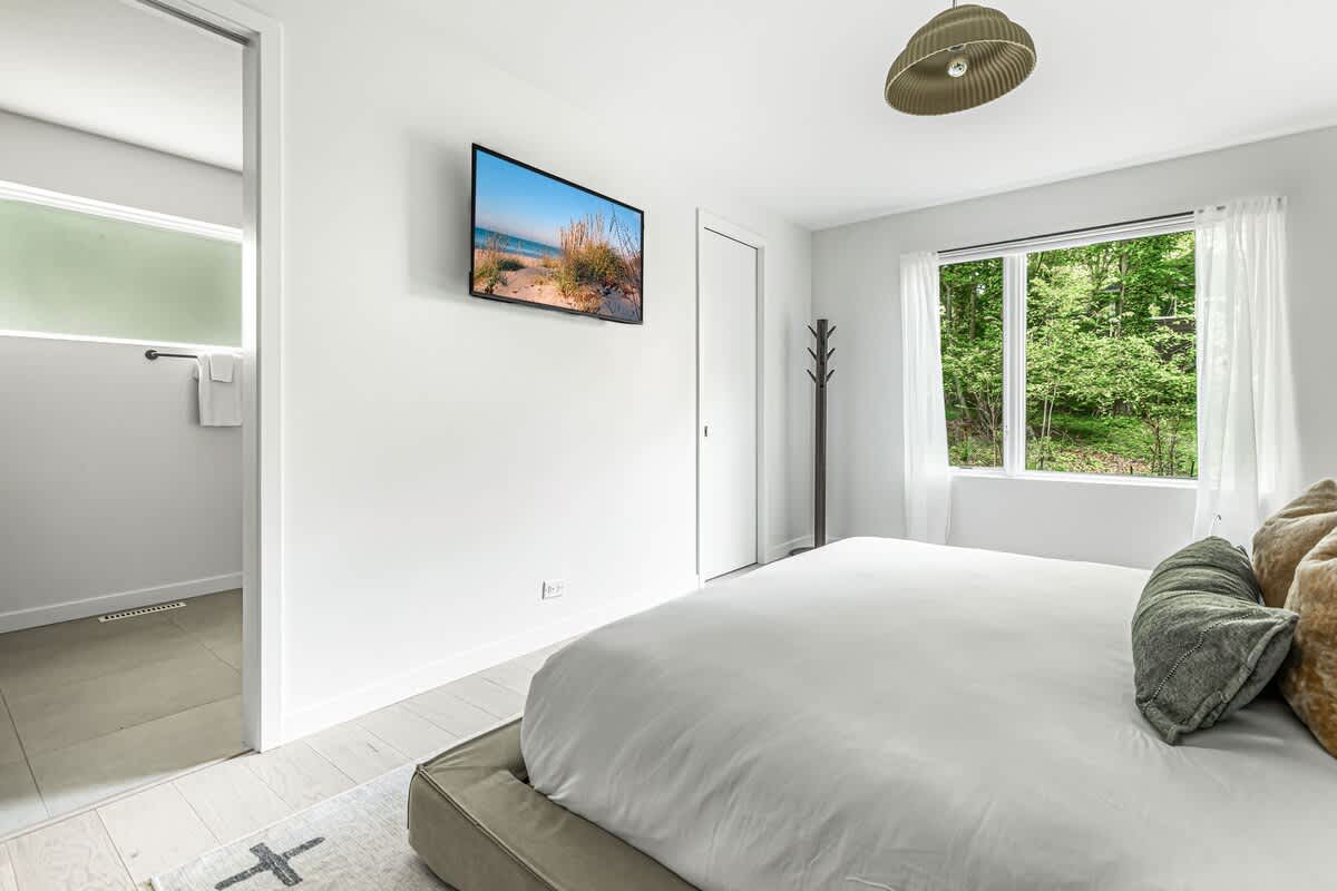 Wake up, roll out of bed, and head straight to your private oasis—closet, bathroom, repeat.