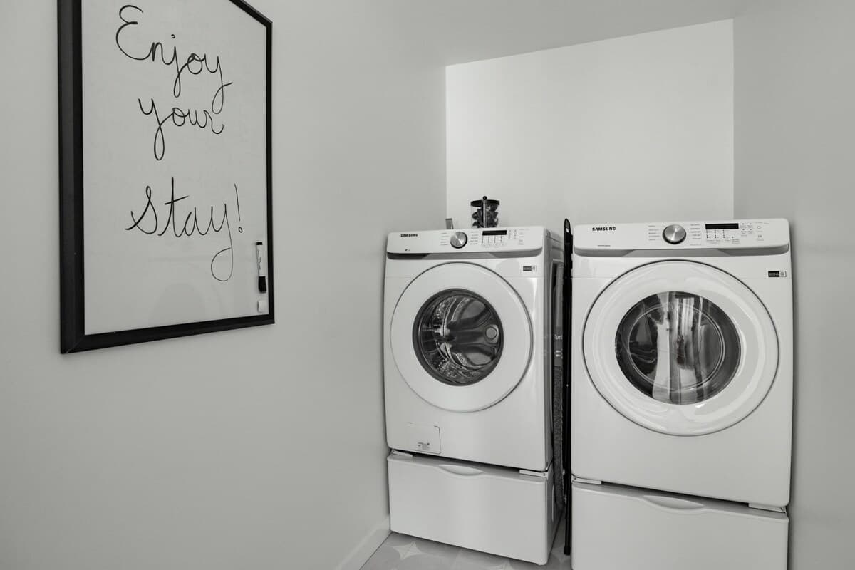 Where clothes go to glow up—this laundry space is serving spotless and stylish.