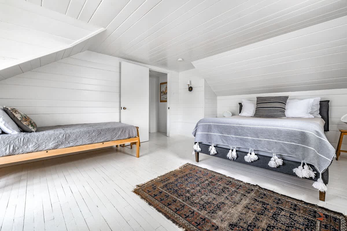 Double the beds, double the coziness. The perfect spot for sleepovers and stories under the roofline!