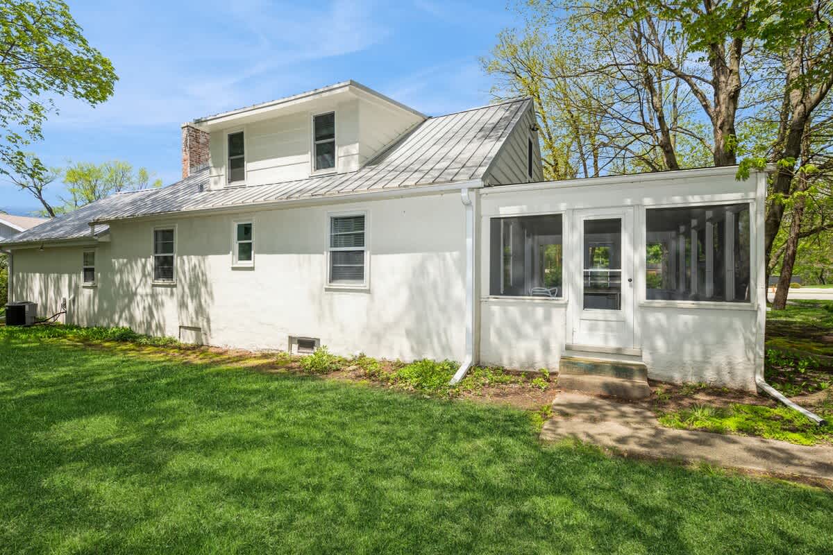 Bright, clean lines and a screened-in porch perfect for peaceful afternoons.