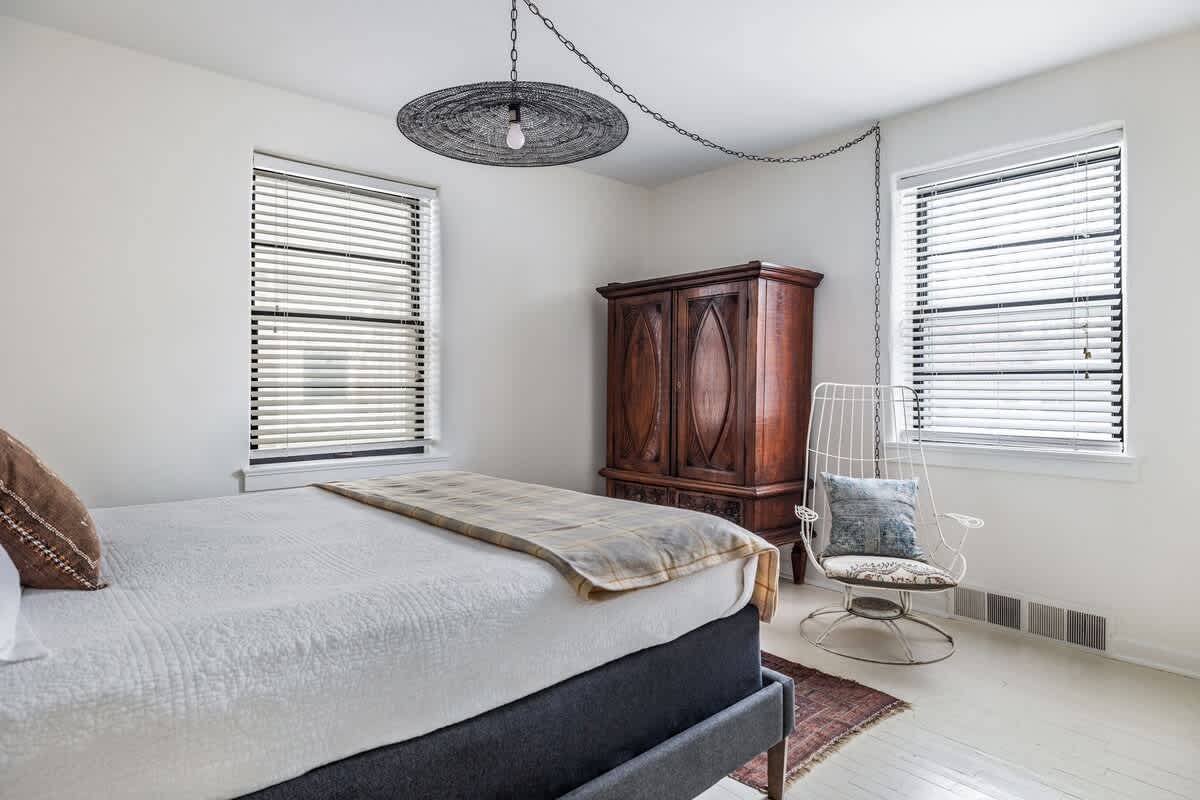 That armoire: timeless. That chair: trendy. That bed: absolutely nap-worthy.