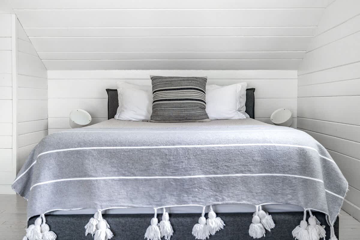 Bedroom 4 is on the upper level & has a queen and 2 twin-size bed.