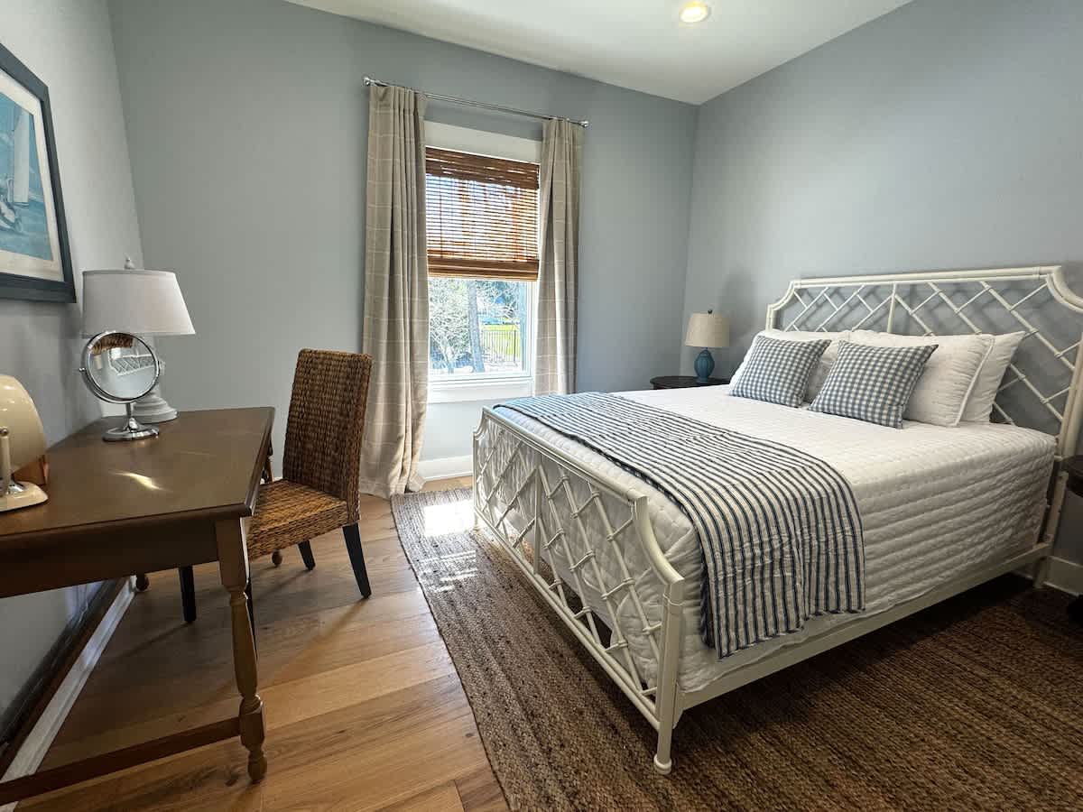 Bedroom 3 is on the main level & has a queen-size bed.