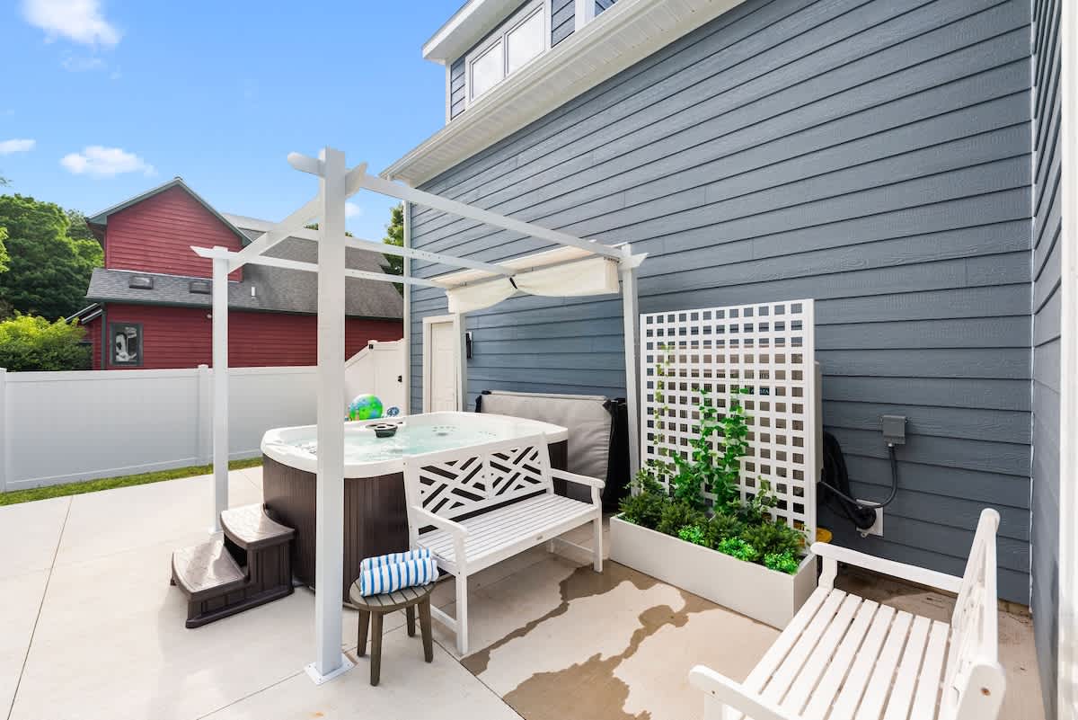 Pop the bubbly and soak under the sun. Your private hot tub oasis awaits!