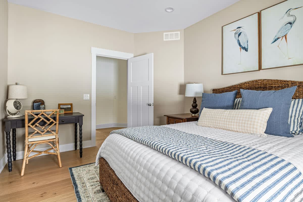 Woven textures, nautical vibes, and a desk for when inspiration strikes—work or relax, your choice!