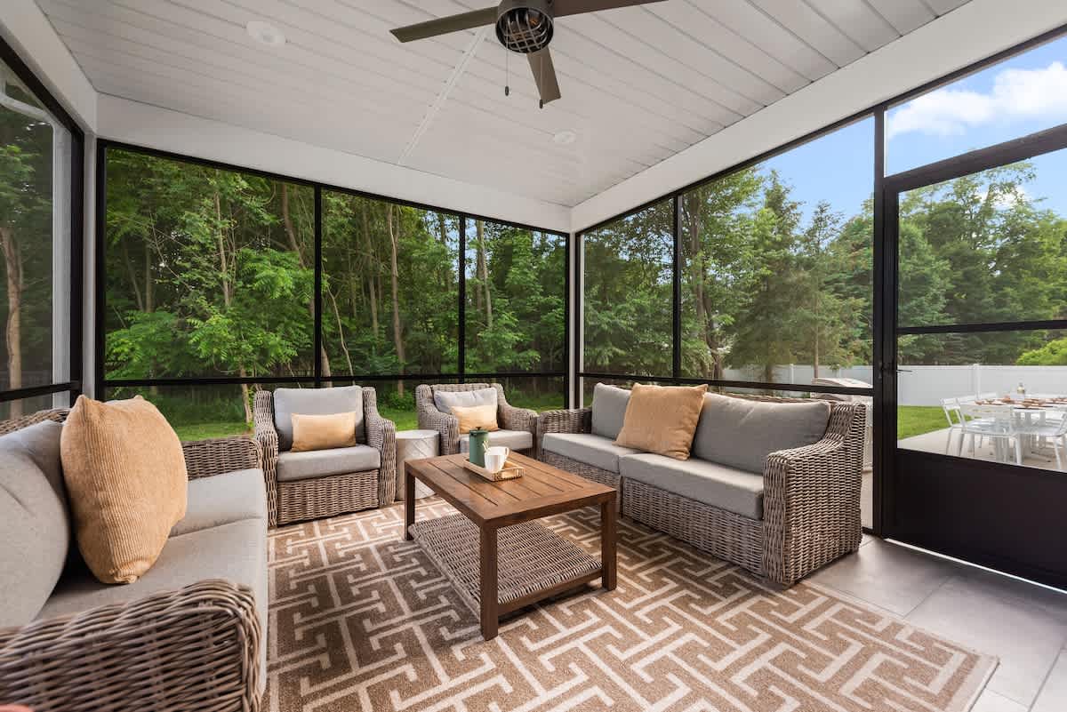 Screened-in serenity for morning coffee or evening wine.