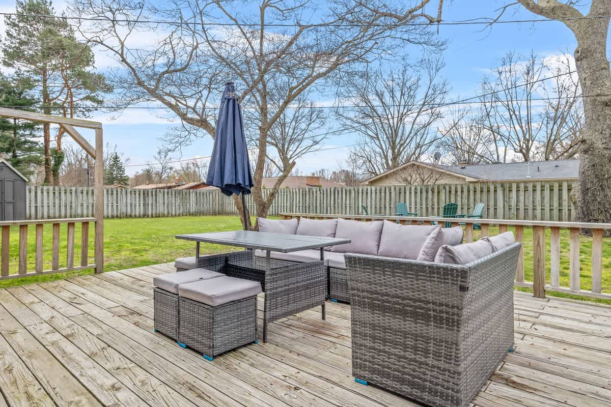 Unwind on our private deck with comfy seating, a spacious yard, and sunny vibes all around.