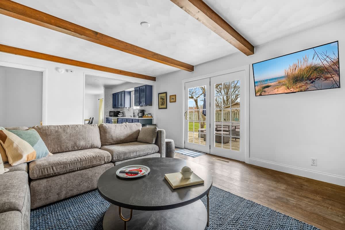 Natural light, soothing vibes, and easy French door access to the backyard.