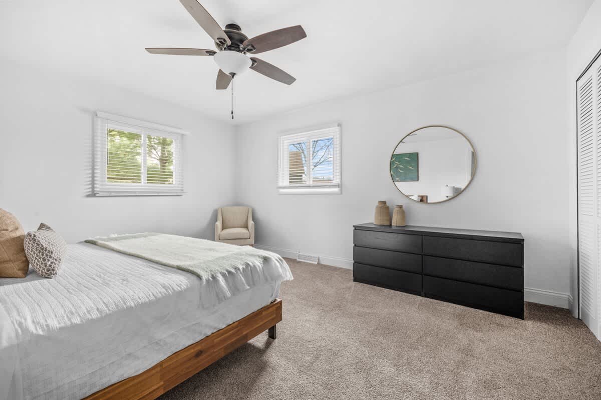 Sunny windows, plush carpet, and calm vibes for the perfect recharge!