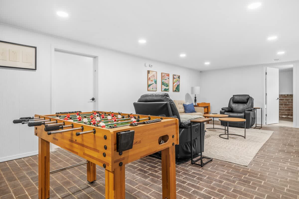 Game on! Kick back with foosball, recliners, and good vibes all around!