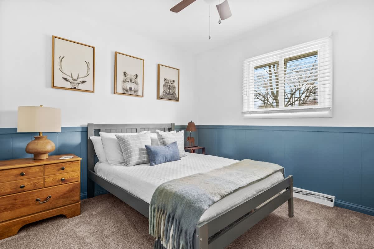 Bedroom 3 is on the main level & has a queen-size bed.