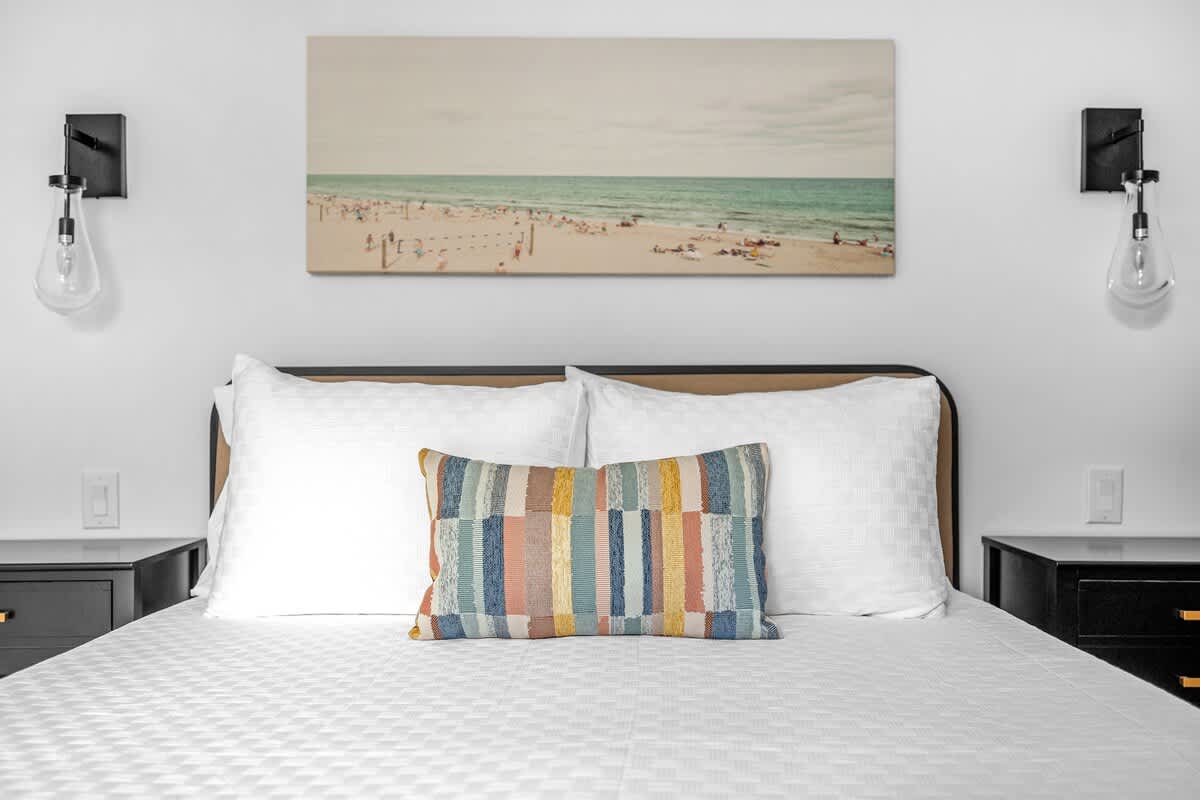 There's nothing better than curling up in this beautiful bed surrounded by fluffy pillows and soft linens.