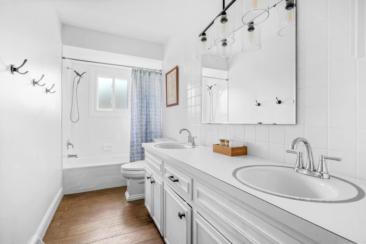 Bright, fresh, and spa-like. This double-sink dream bathroom is made for relaxing getaways!