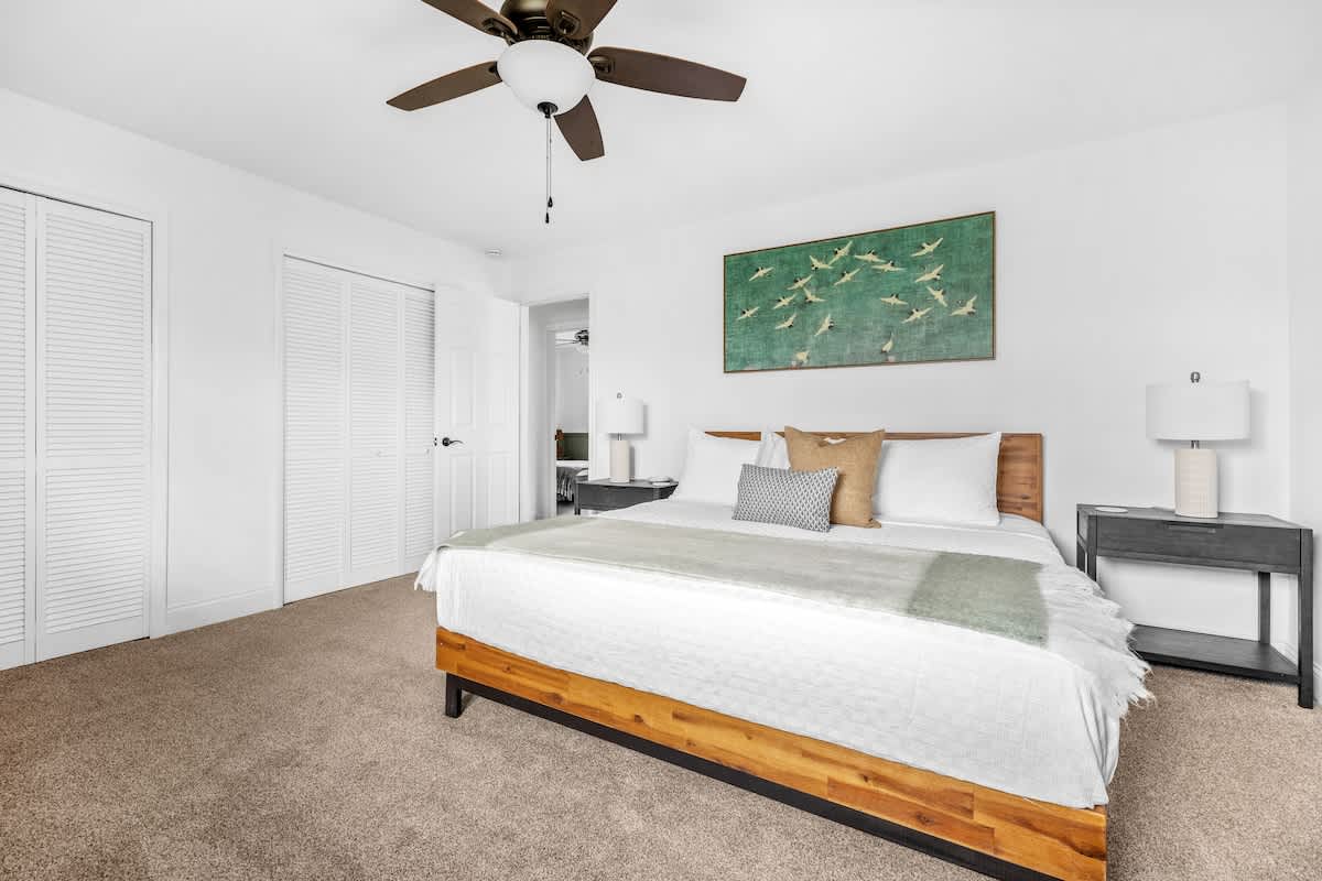The primary bedroom is on the main level & has a king-size bed.